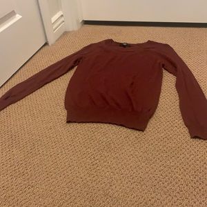 Maroon colored sweater